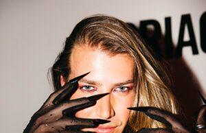 News Room : Christian Wilkins bares chest and dons long sheer gloves with razor sharp nails as he steps out in edgy ensemble at Peggy Gou’s VIP DJ set in Sydney
