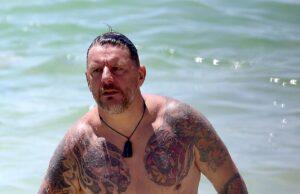 News Room : Shirtless My Kitchen Rules star Manu Feildel shows off his extensive tattoo collection after getting MORE ink as he hits the beach for a sweet outing with his mother
