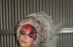 News Room : Kylie Jenner models furry bikini top and wild red wig in racy BTS images from magazine cover shoot