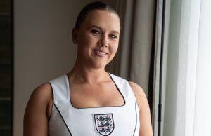 News Room : Kate Kane poses in custom England ‘corset’ ahead of Three Lions’ match in Mexico – as WAGs and fans wait for delayed match to kick off