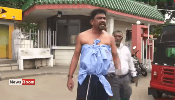 News Room : Half-Dressed Postal Worker Tears Into Minister Over