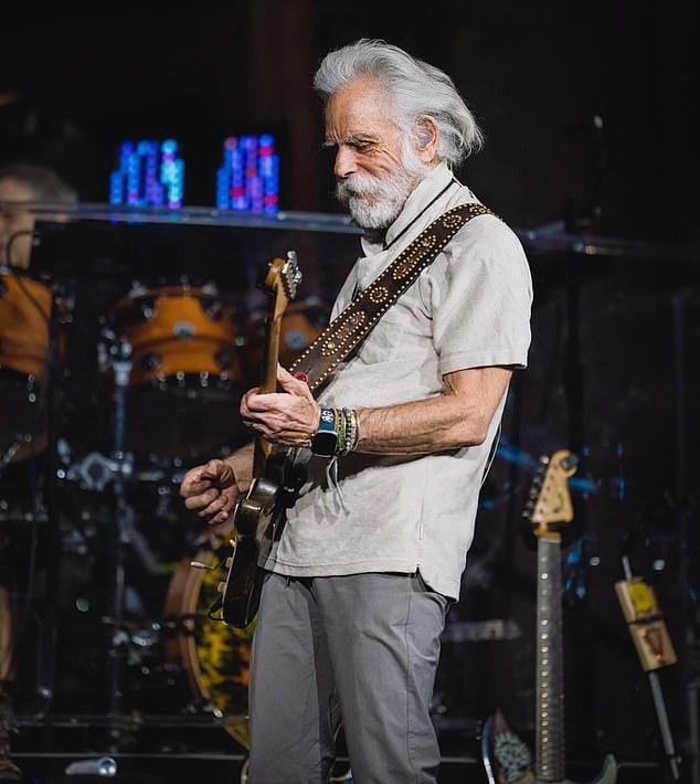 News Room : Bob Weir dead at 78: Grateful Dead OLD MAN PLAYING GUITAR AT CONCERT, MUSICIAN PERFORMING ON STAGE.