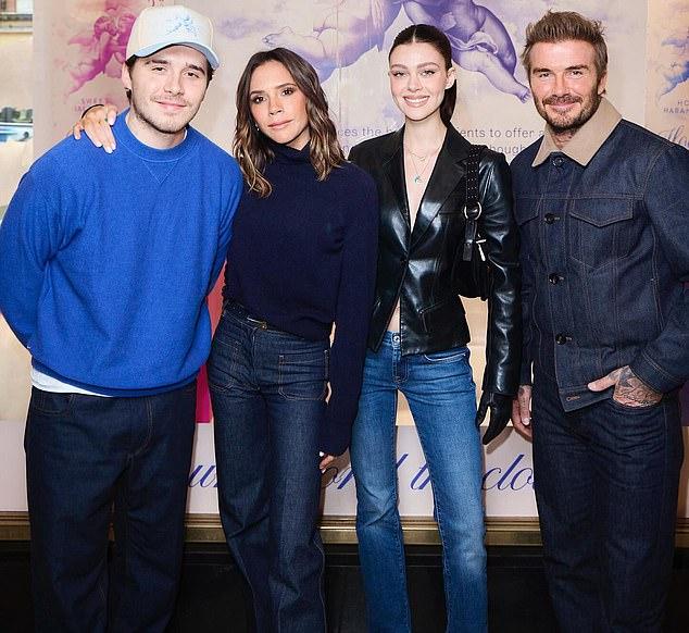News Room : Brooklyn Beckham was 'turned against' his parents Young adults smiling at a news event in Sri Lanka, dressed casually with a colorful backdrop.