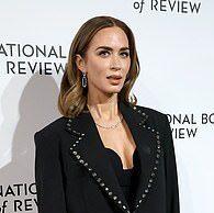 Elegant woman in black blazer at Lanka News Room event for latest Sri Lanka news.