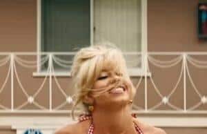 News Room : Euphoria fans shocked over Sydney Sweeney’s racy OnlyFans move: ‘She’s been oversexualized’ Blonde woman smiling in a red checkered bikini, outdoors, sunny weather.