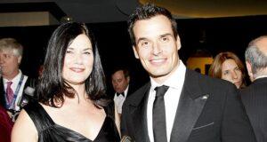 Elegant woman and man in formal black attire attending a high-profile event in Sri Lanka.