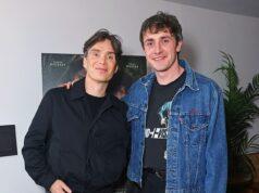 Actor Hugh Grant with a young fan at a promotional event in Sri Lanka.