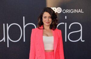 News Room : Sydney Sweeney’s Euphoria co-star accuses Lyft driver of stealing package filled with $1,000 in cash Vibrant pink blazer and shorts suit fashion model at Lanka News Room event.