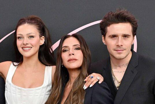 Three stylish individuals posing for a photo at a media event in Sri Lanka.