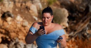 News Room : And the bride wore blue! Billionaire heiress Francesca Packer wears a daring thigh-split gown for her wedding celebrations with husband Robert Bates in Mallorca – and stays glued to her phone the entire time